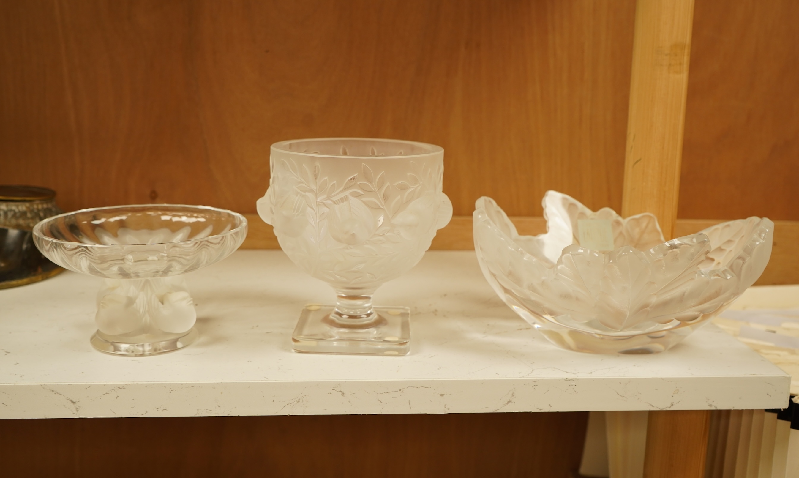 Three lalique glass pieces comprising an 'Elisabeth' vase, a 'Compiegne' dish and a 'Nugent' bowl, each signed, largest 19cm wide